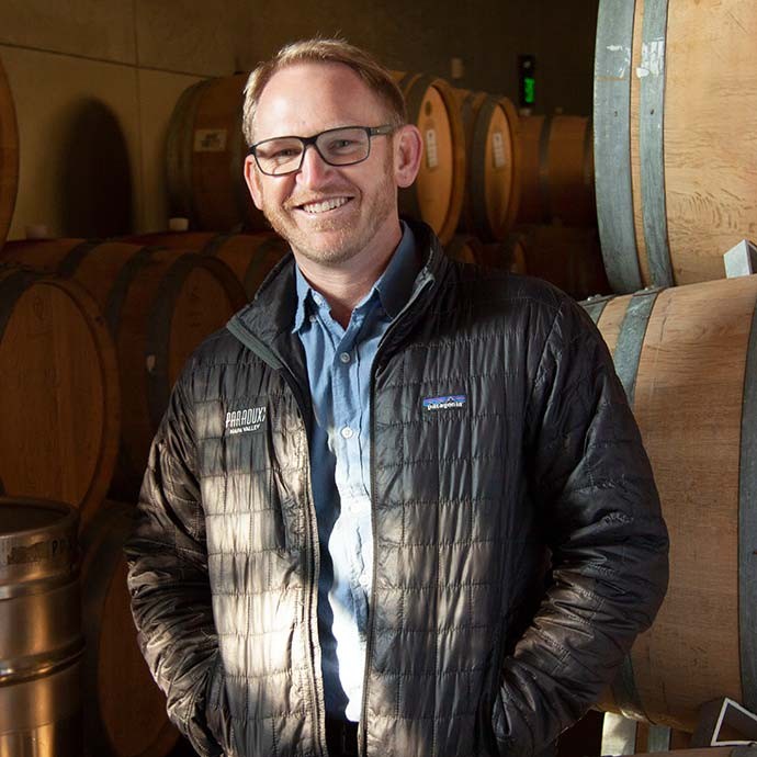 Winemaker Cardiff Scott-Robinson in Paraduxx barrel room